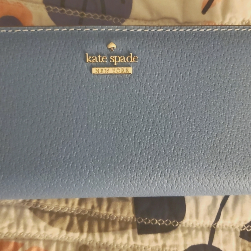 kate spade blue wallet. Never been used!!
